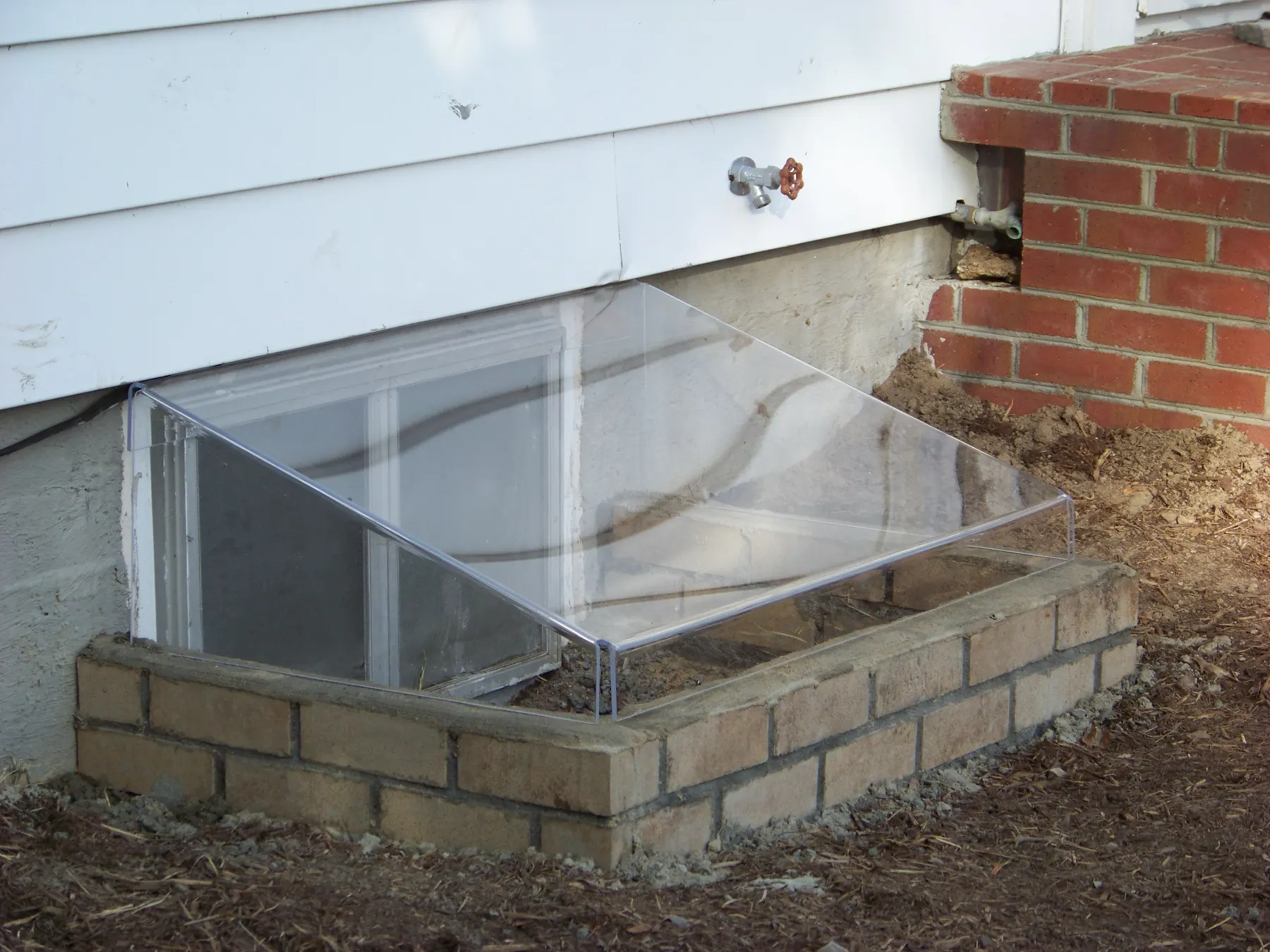 Window Wells & Covers